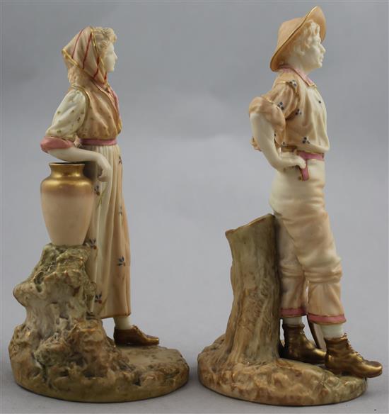 A pair of Royal Worcester porcelain figures of The Navvy and His Companion, modelled by James Hadley, c.1896, 17.5cm